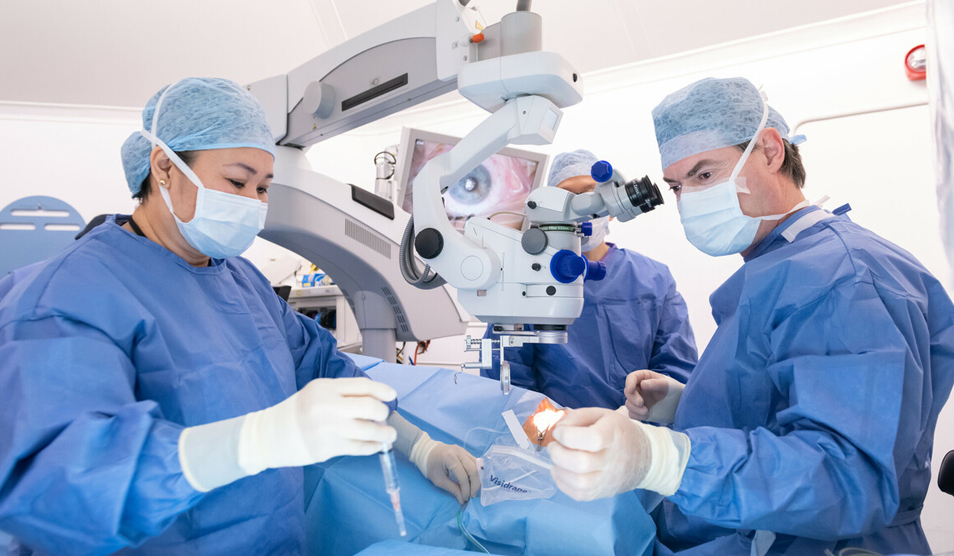 Clinicians performinc eye surgery at Western Eye Hospital